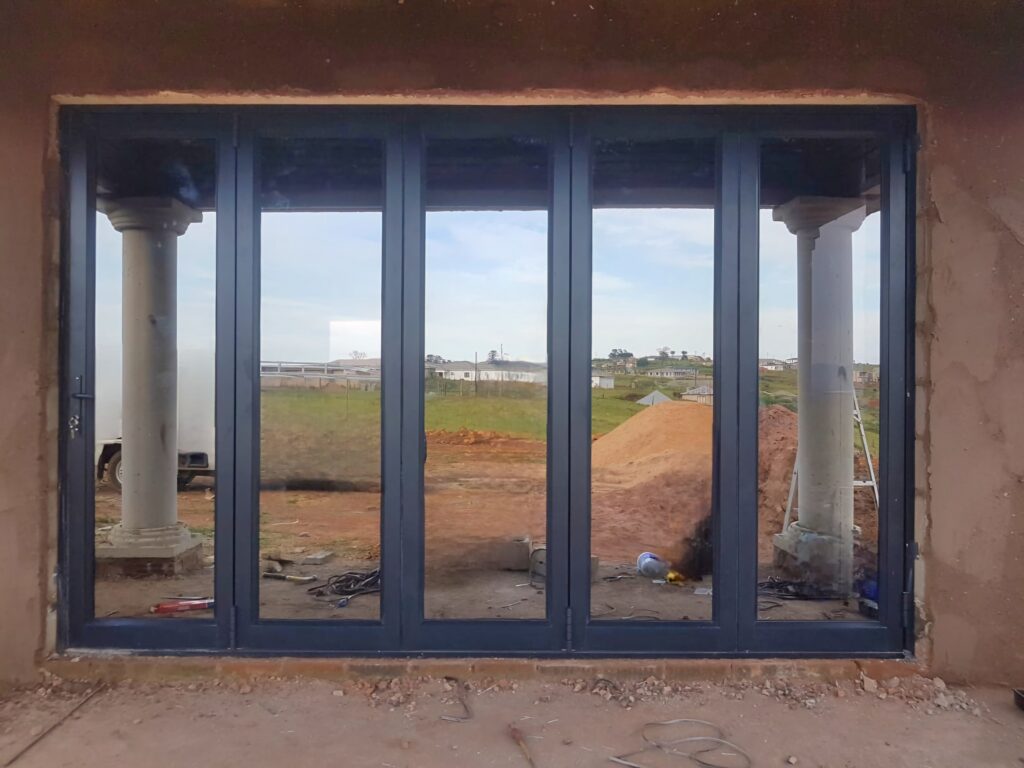 Charcoal grey five-panel aluminium folding door