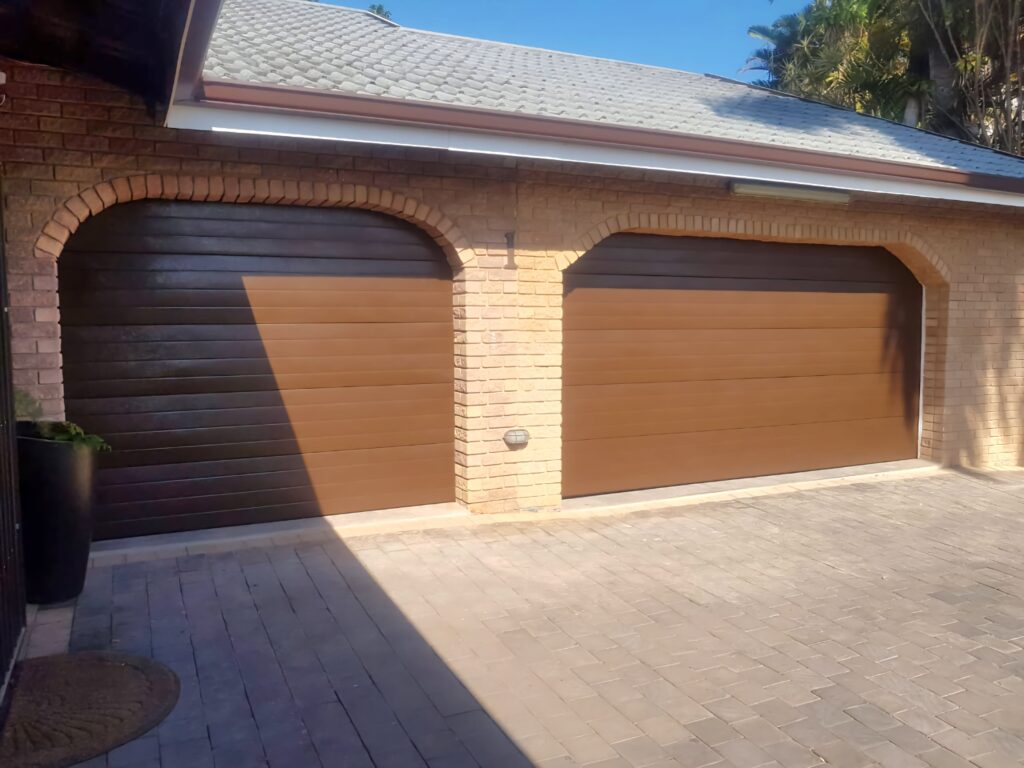 Pair of timber-finish arched garage doors