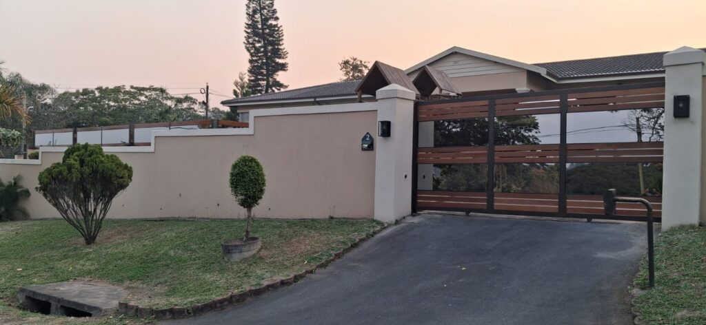 Driveway gate manufactured and installed by Quality Design Doors